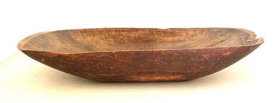 Very large antique trencher showing hand planed work on undersides, 32 1/2” long, 16” wide