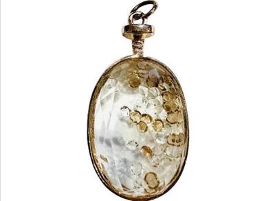 Sale Photo Thumbnail #134: Faceted Crystal & Gold Tone Pendant With Interior Stone Crystals