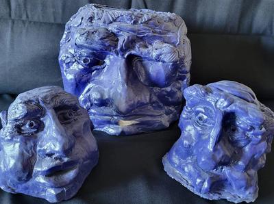 BLUE HEAD SCULPTURES BY DAVID MACINNES