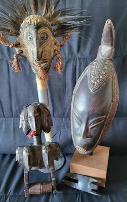 ASSORTED TRIBAL MASKS AND ITEMS