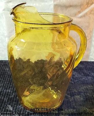 Vintage amber goldyellow pressed swirl glass pitcher