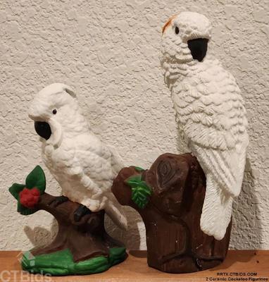 2 ceramic cockatoo figurines