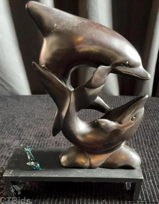 Dolphin figurine and small glass whale