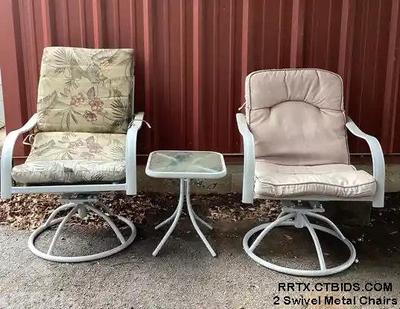 2 swivel metal chairs