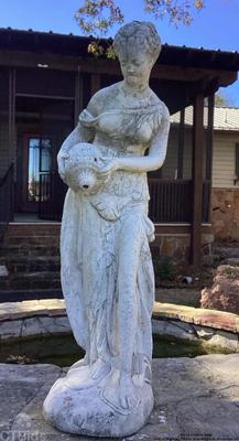 Lady with water pitcher detailed piece of cement art