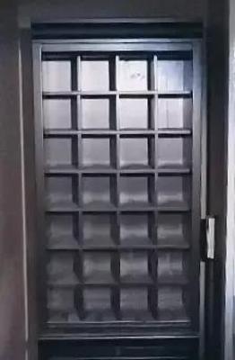 TALL BLACK WOODEN WINE CABINET 