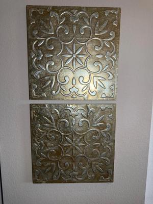 Set of Two Antique-Style Carved Metal Wall Hangings