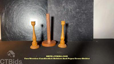 Two wooden candlestick holders and paper tower holder rrtx ctbids.com