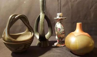 FOUR UNIQUE POTTERY ITEMS