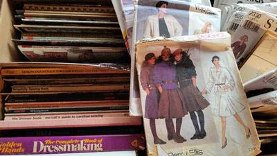 MYSTERY LOT OF SEWING PATTERNS AND BOX OF SEWING BOOKS