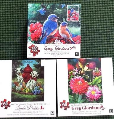 3) 550pc jigsaw puzzles birds, flowers, dogs