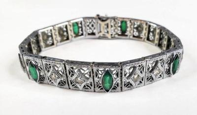 A diamond emerald 14k gold art deco filligree bracelet