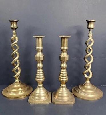 2 pairs of brass candlesticks