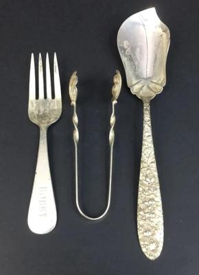A trio sterling silver utensils
