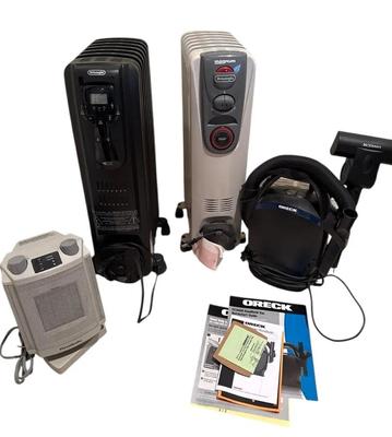 CE520 - Group Of DeLonghi Heaters, Heat Safe Heater, And Oreck Handheld Vacuum