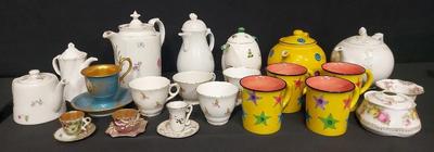 COLORFUL COLLECTION OF TEA POTS, SAUCERS, AND TEA CUPS - LOT OF 25