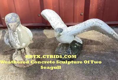 Weathered concrete sculpture of two seagull rrtx ctbids.com