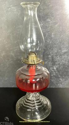 Vintage clear glass oil lamp with red fuel rrtx ctbids.com