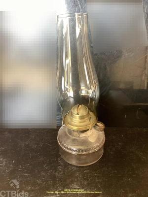 Vintage clear glass oil lamp with eagle brass burner rrtx ctbids.com