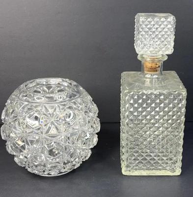 Glass decanter and round vase