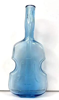 Blue cello shaped glass bottle