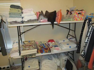 Sale Photo Thumbnail #58: Ladies' boutique with blouses, tops, dresses, pants, casual items, jeans, designer purses, belts, shoes, hats, and more. We also have an incredible selection of cosmetics and more—as well as sewing items and a Singer Sewing Machine.