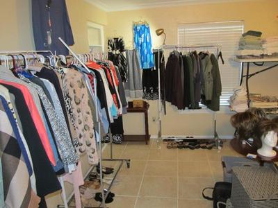 Sale Photo Thumbnail #47: Ladies' boutique with blouses, tops, dresses, pants, casual items, jeans, designer purses, belts, shoes, hats, and more. We also have an incredible selection of cosmetics and more—as well as sewing items and a Singer Sewing Machine.