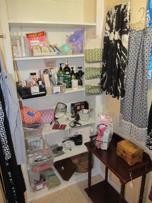 Sale Photo Thumbnail #57: Ladies' boutique with blouses, tops, dresses, pants, casual items, jeans, designer purses, belts, shoes, hats, and more. We also have an incredible selection of cosmetics and more—as well as sewing items and a Singer Sewing Machine.