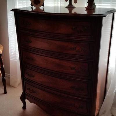 Chest of drawers, angel, decorative tree
