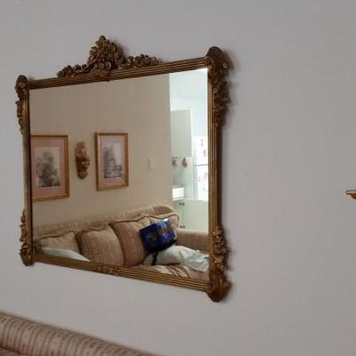 Ornate mirror, wall shelf, angel
