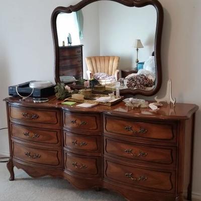 dresser, mirror, vanity items
