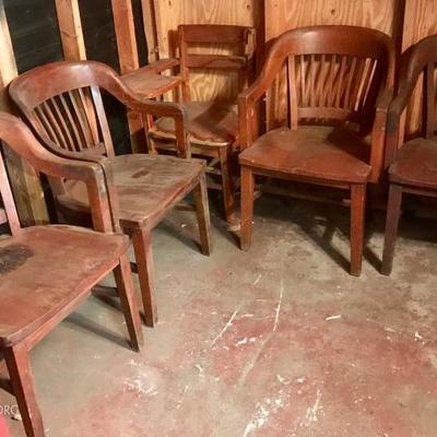 Vintage W. H. Gunlocke bank chairs with tags on back that say 