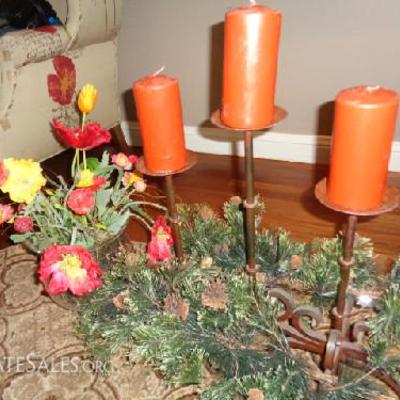 Two Beautiful center pieces

-Fish bowl vase with realistic flowers -Three tier candle holder, metal base, realistic pine needles and...