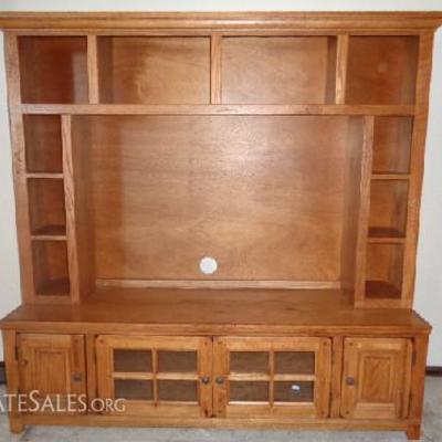 Beautiful Rustic Style Console Hutch

-2 Long shelves behind doors -2 Small cabinets with CD holders built in -10 Storage cubbies (needs...