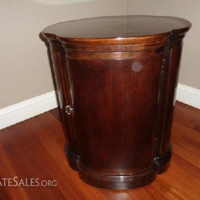 Mahogany drum style side table with hidden storage

20