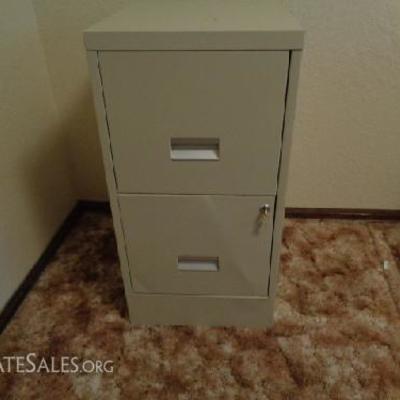 Two Drawer Tan Filing Cabinet

-Has key have to wiggle key to make it work -Bottom drawer is a little dented -Comes with 4 extra file...