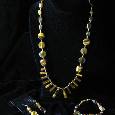 Tiger Eye Necklace shown with a pair of Tiger Eye Pierced Earrings and Bracelet
