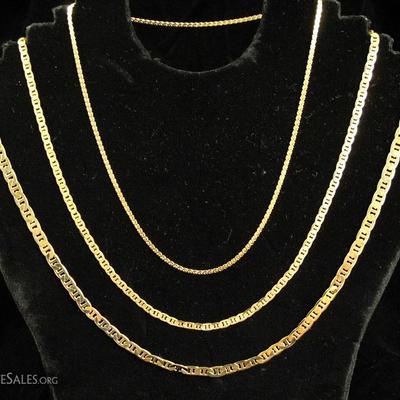 A collection of 14-karat gold necklaces