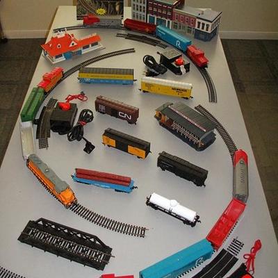 Bachmann HO Scale Train Sets and Accessories shown with Design Preservation Models HomScale Buildings.  Lots of Bachmann and Atlas...