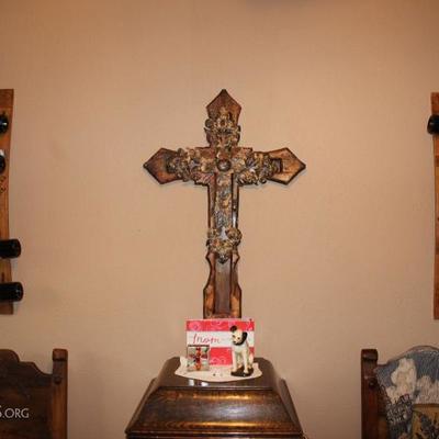 large cross, wine shelf
