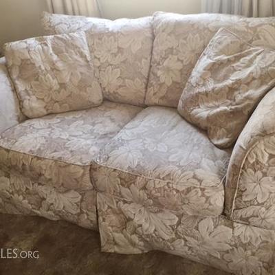 One of two matching Loveseats in the Living Room