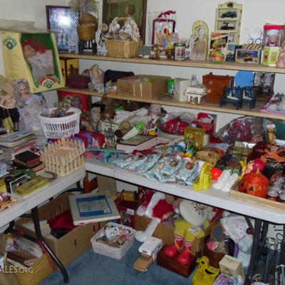 A room filled with doll accessories, toys and misc household items, mostly vintage