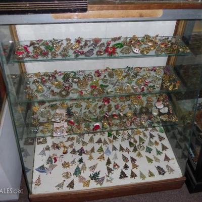 Over 1000 vintage Christmas tree brooches and pins...far more than pictured here