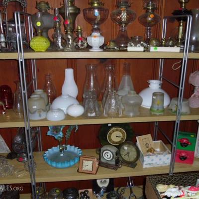 Lamps, oil lamps, clocks, snow babies, a gorgeous antique Epergne
