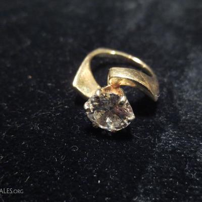 14Kgold and cubic zirconia engagement ring, has matching wedding band in next frame
