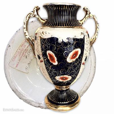 One of a pair of rare, antique porcelain urns from the former Atlanta Paces Ferry antique shop of Gerald R. Brown; original price tag,...