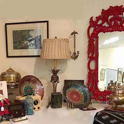 Large brass brazier and full view of mirror which is more fire-engine red than blue-red