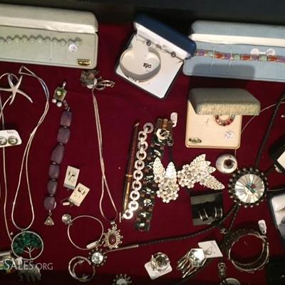 Sterling, 14 Karat and Vintage Jewelry in the case by checkout
