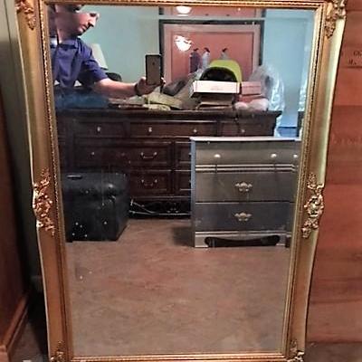 Beveled mirror with beautiful gilt frame