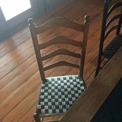 Detail of ladder back chair with woven seat